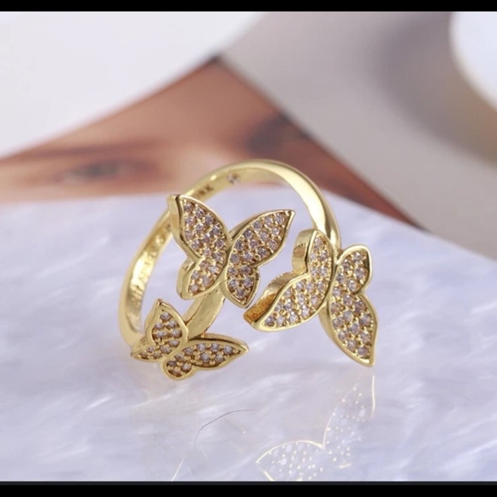 Women's Gold plated butterfly ring from katespade size 8 adjustable